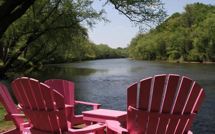 Adirondack chairs looking out over the Catawba River